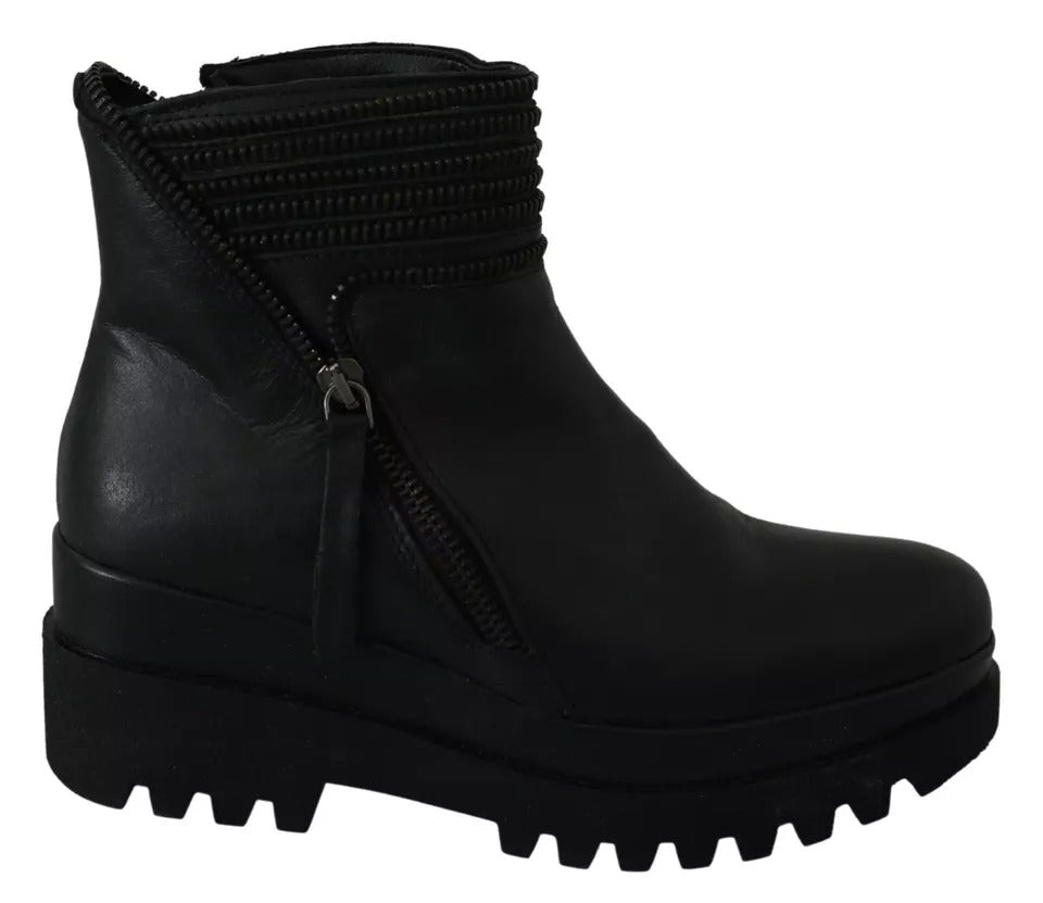 Ovyé Schwarze Lederstiefeletten mit Reißverschluss