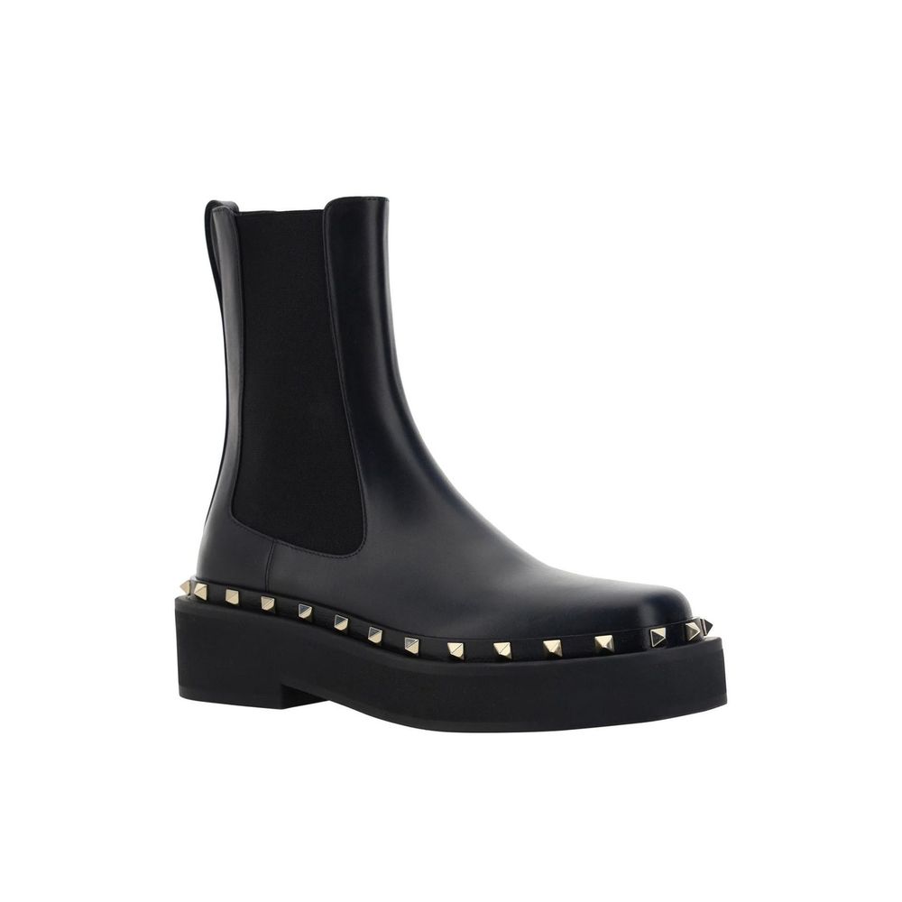 Bottes plates Valentino Garavani en veau noir