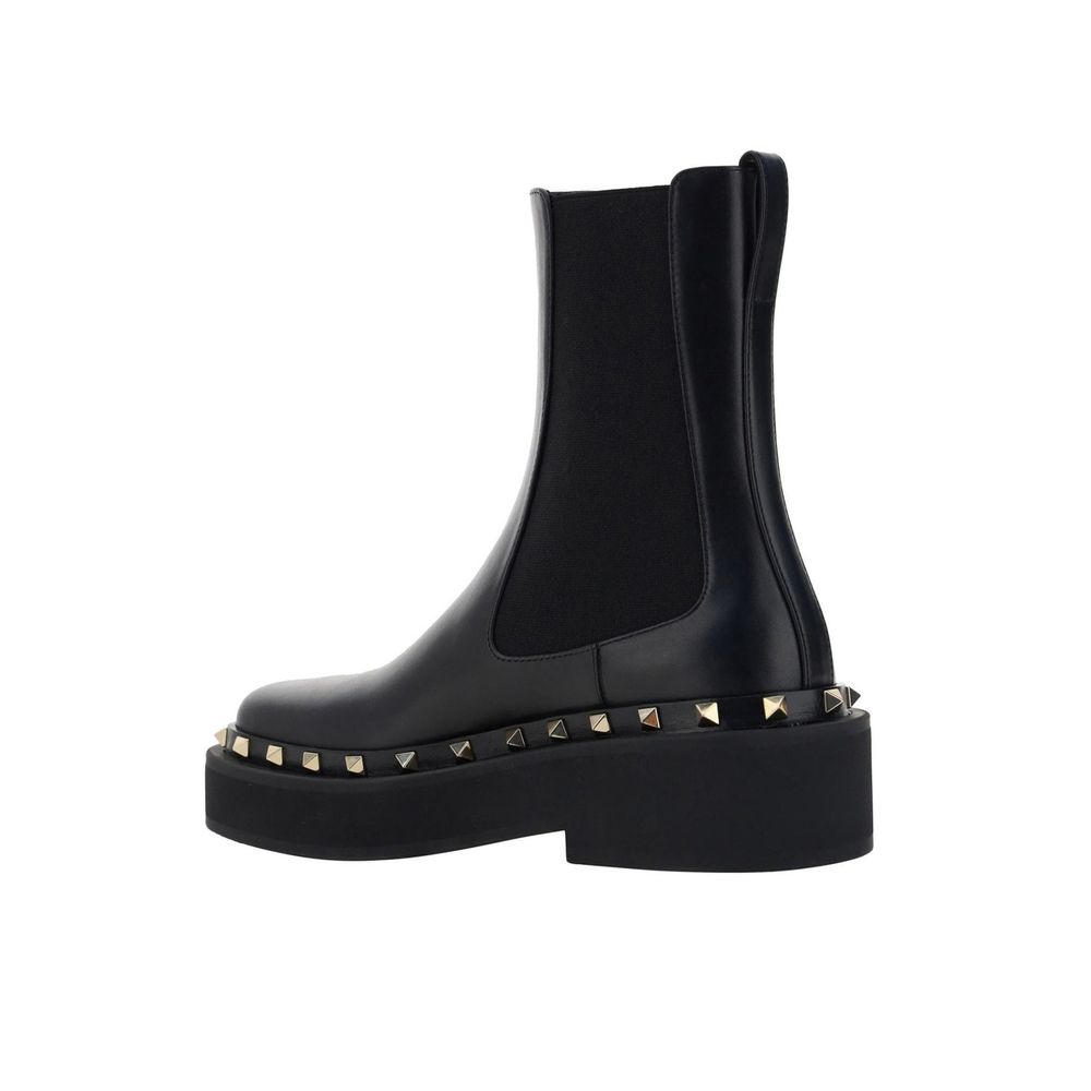 Bottes plates Valentino Garavani en veau noir