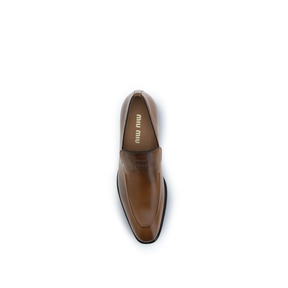 Mocassins à enfiler Miu Miu en cuir de veau marron Bos Taurus