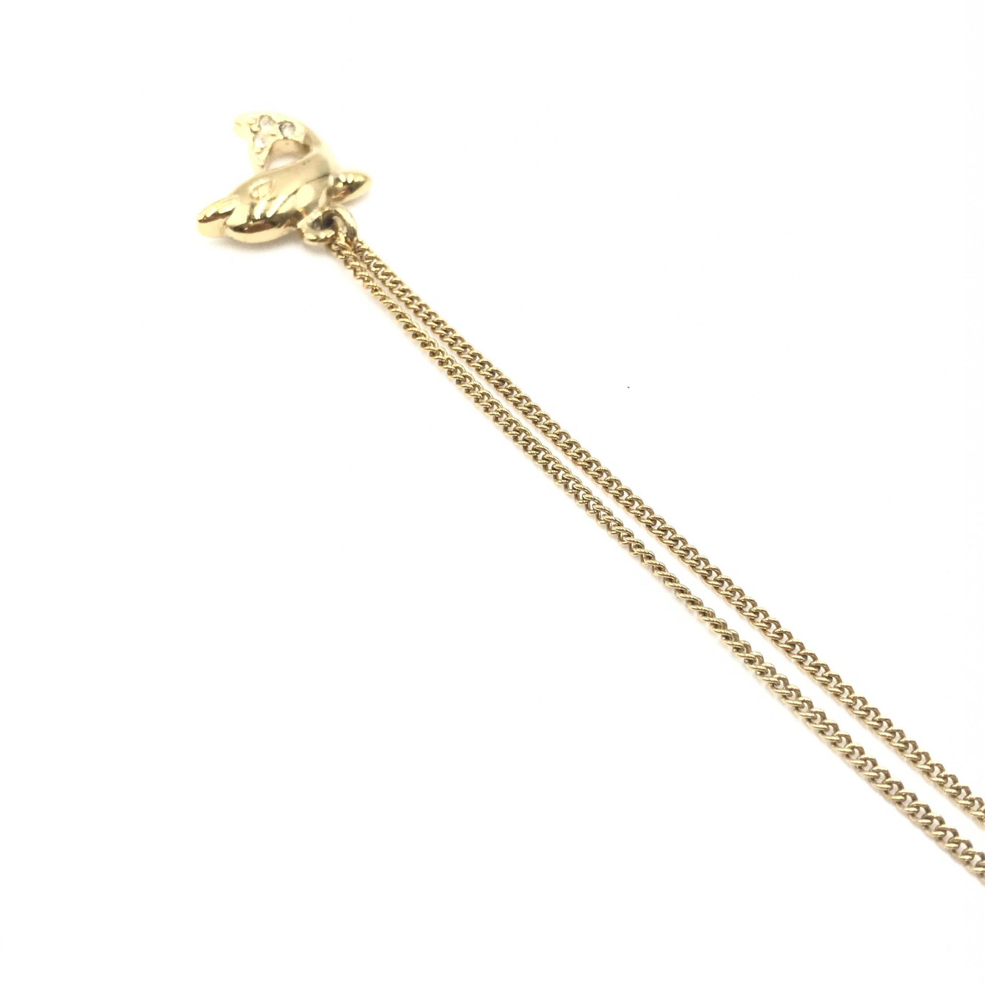 Collier Christian Dior motif dauphin en strass et plaqué or
