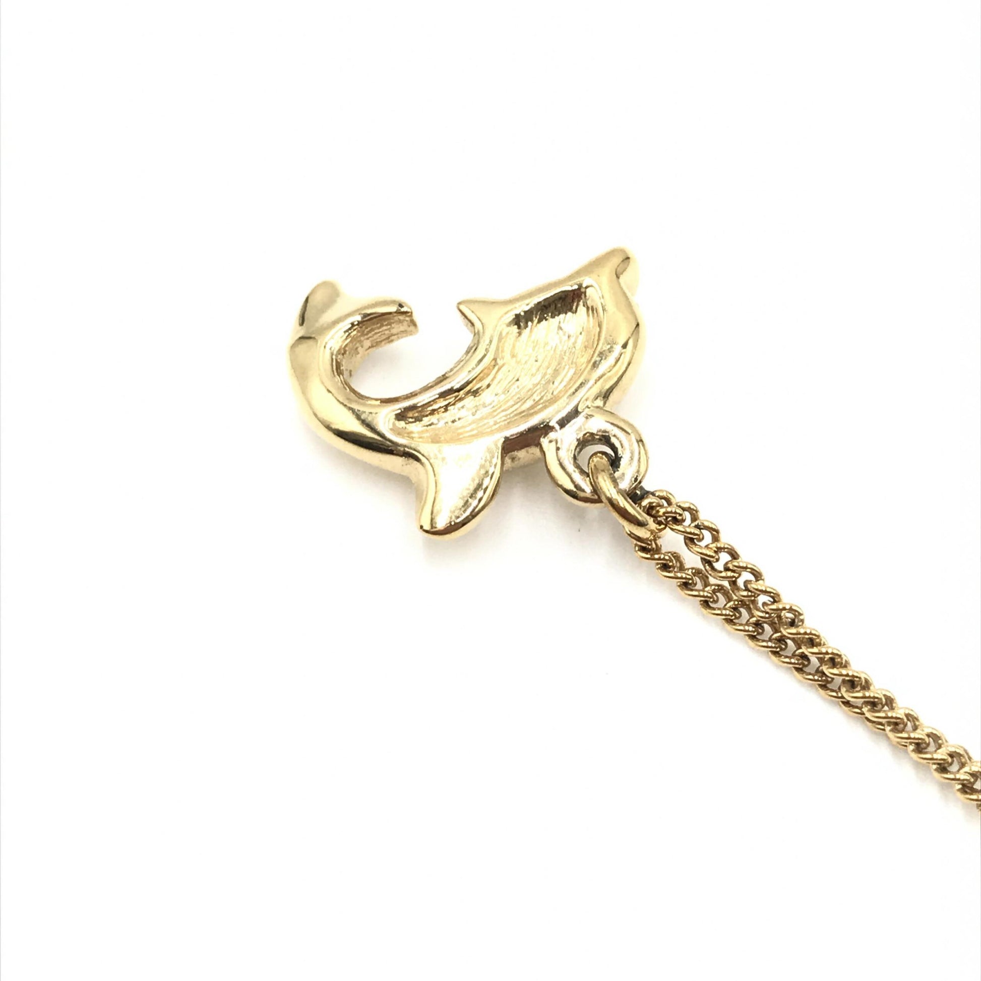 Collier Christian Dior motif dauphin en strass et plaqué or