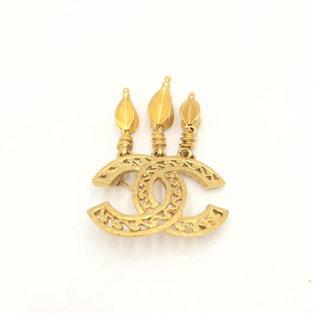 Broche Chanel plaqué or avec logo CC