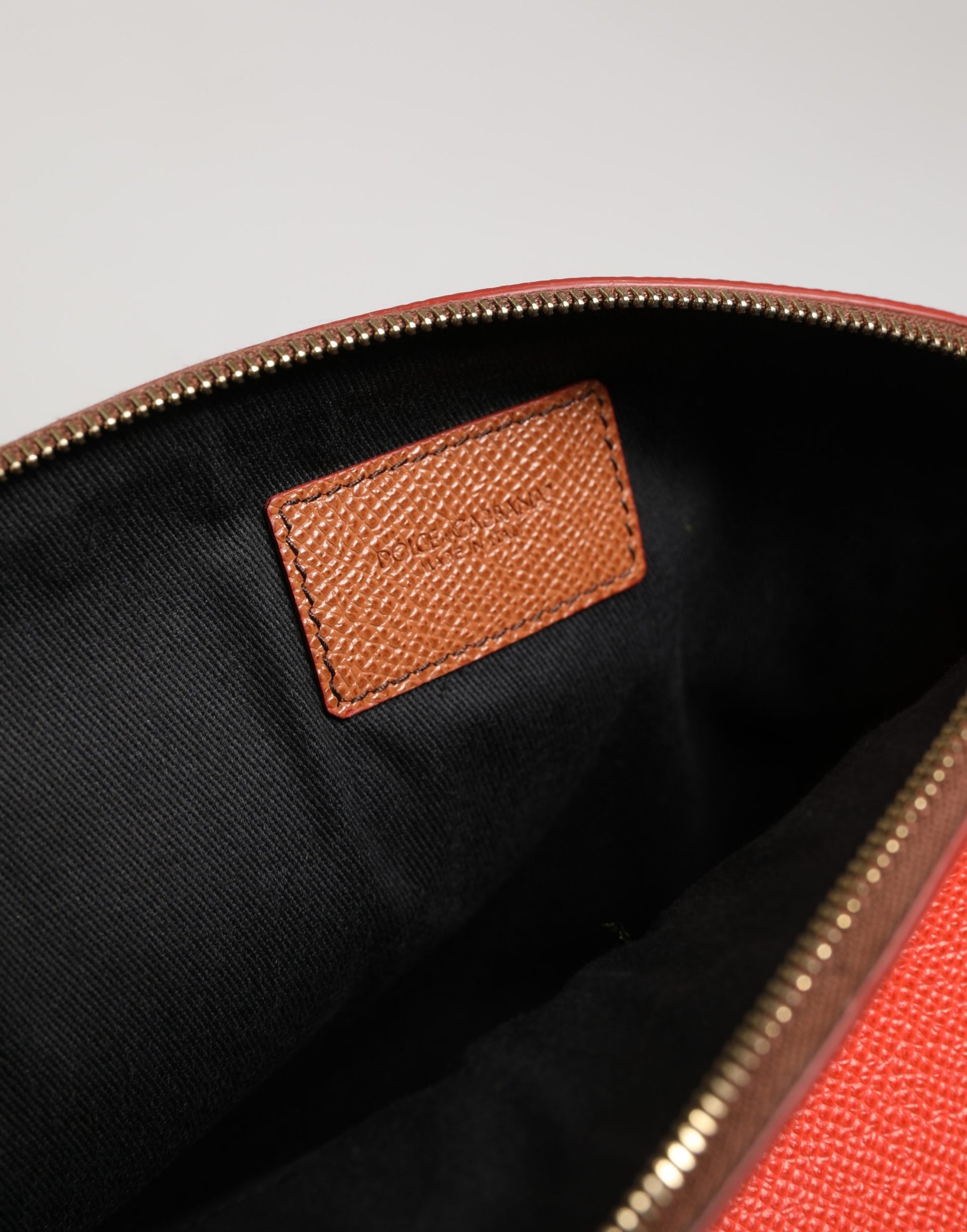 Portefeuille zippé Dolce & Gabbana en cuir orange beige avec logo DG