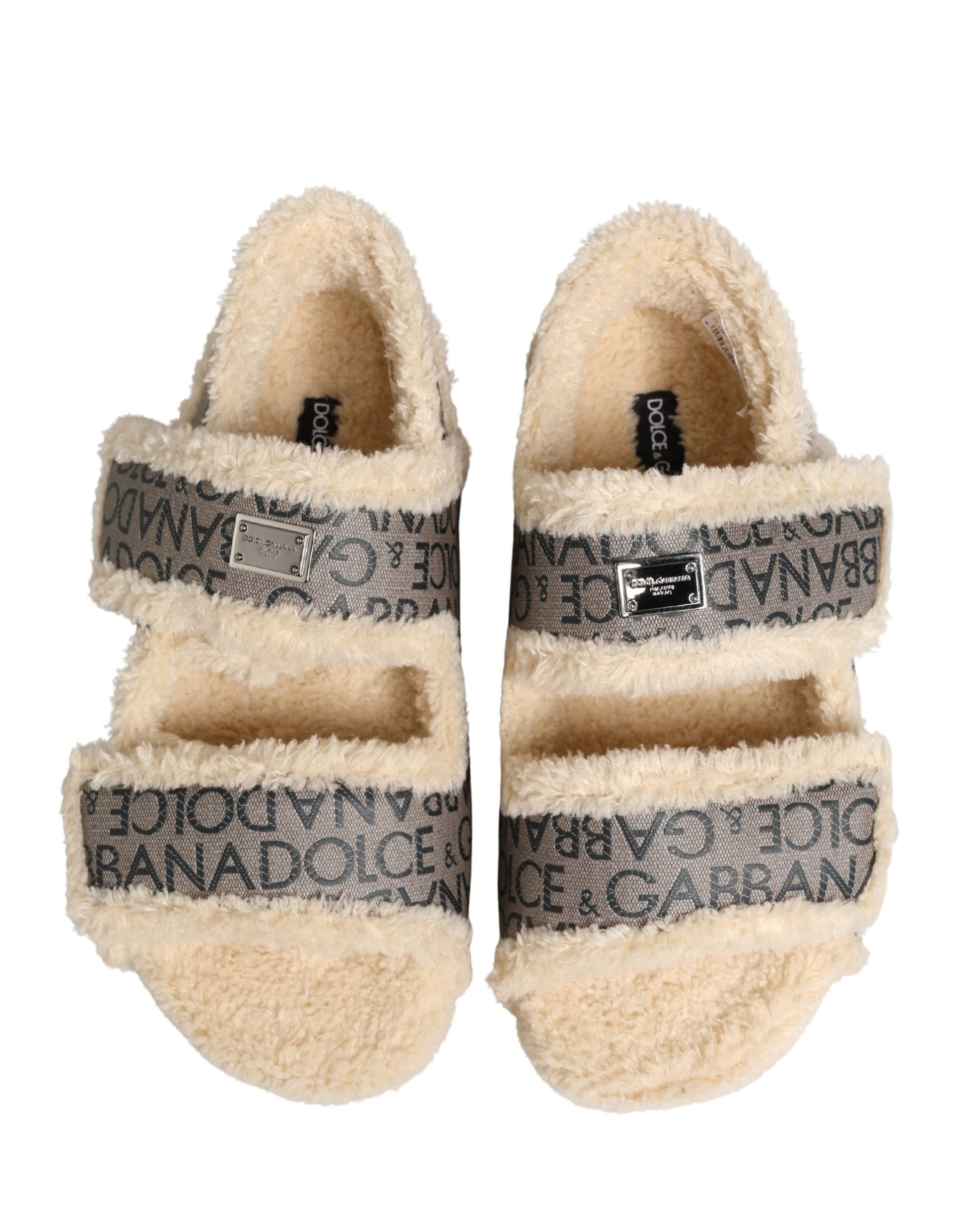 Chaussures sandales plates Dolce & Gabbana beiges en fausse fourrure à logo imprimé