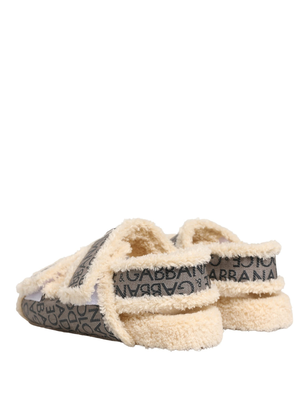 Chaussures sandales plates Dolce & Gabbana beiges en fausse fourrure à logo imprimé