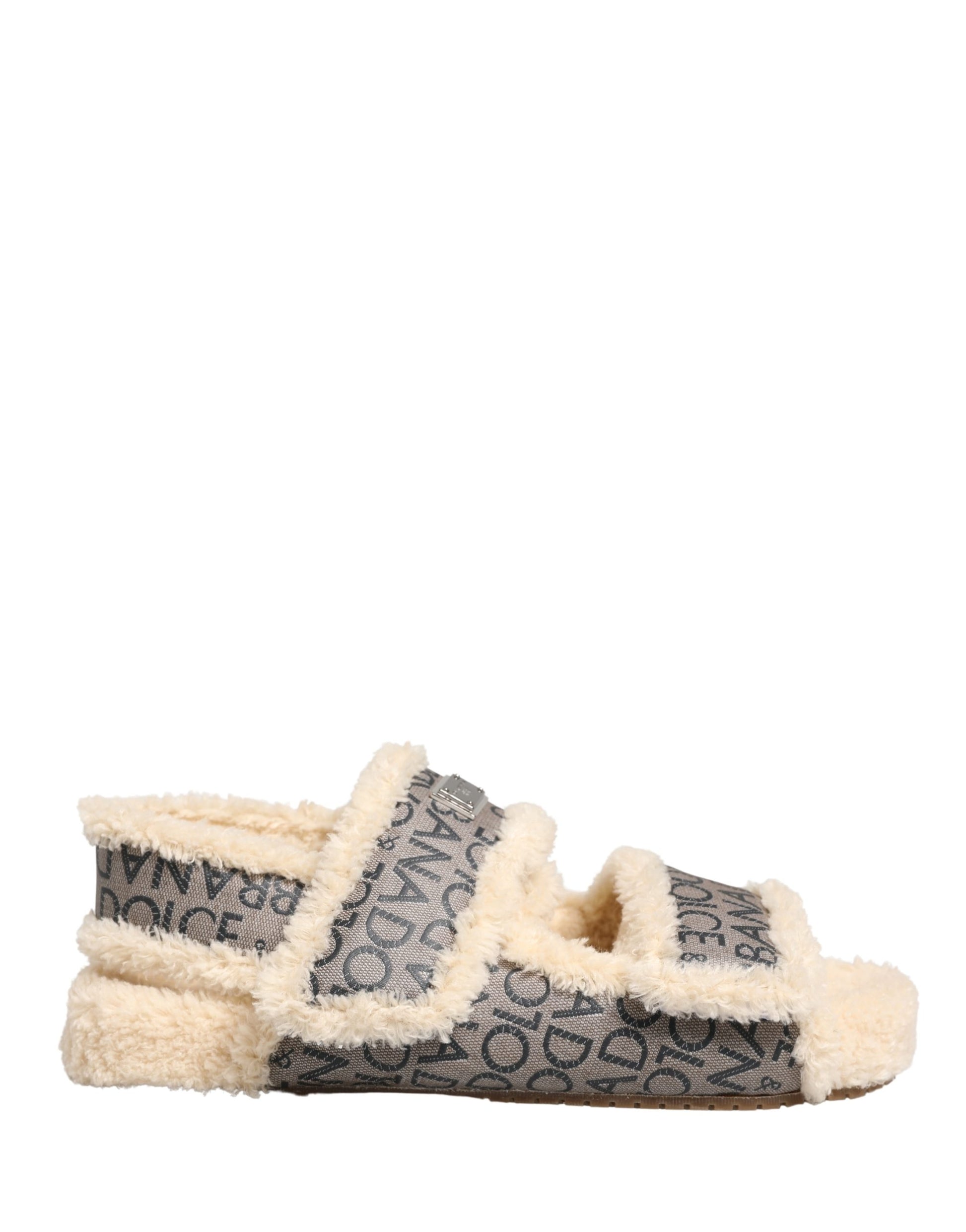 Chaussures sandales plates Dolce & Gabbana beiges en fausse fourrure à logo imprimé