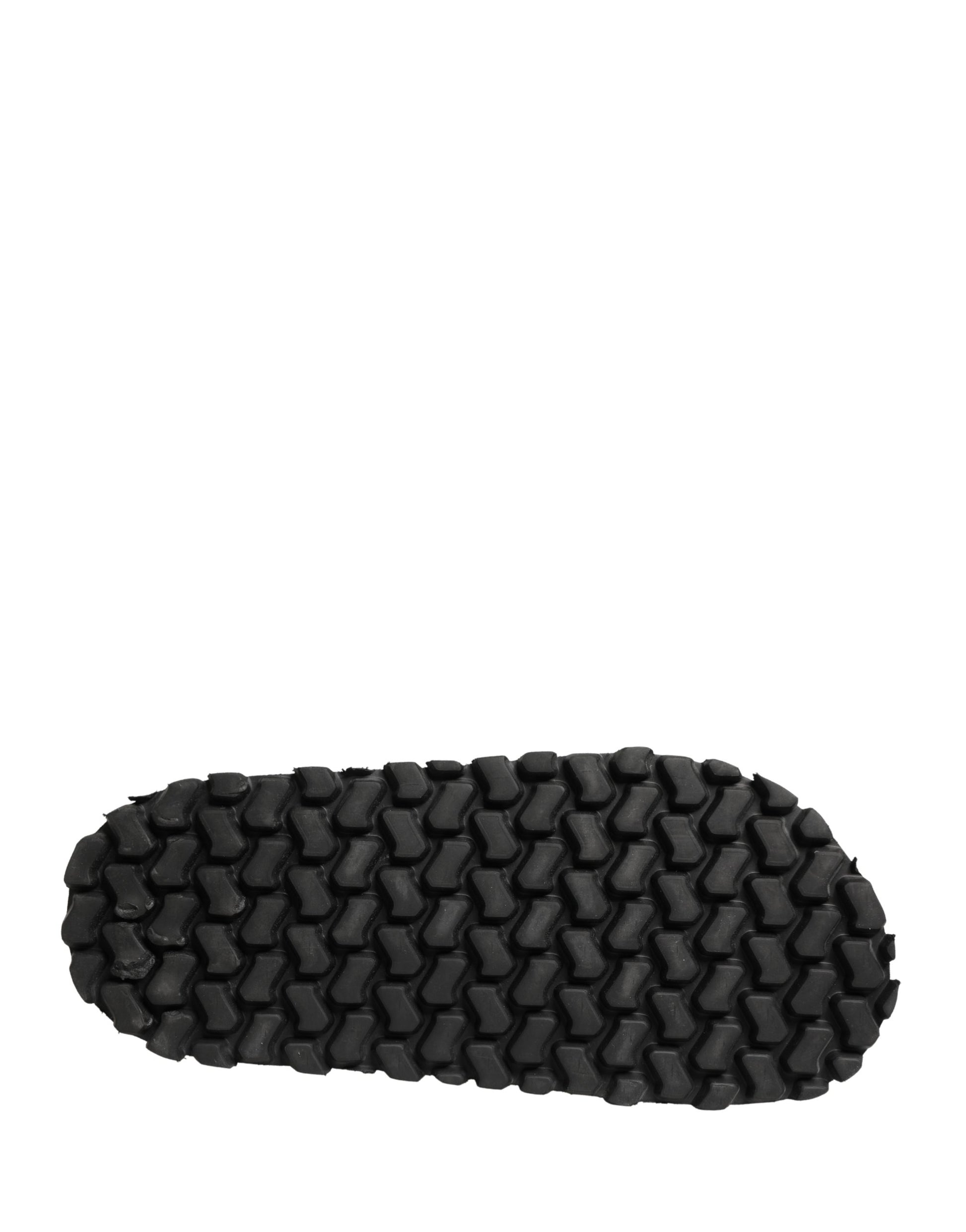 Sandales plates noires Dolce & Gabbana avec détails froncés pour homme