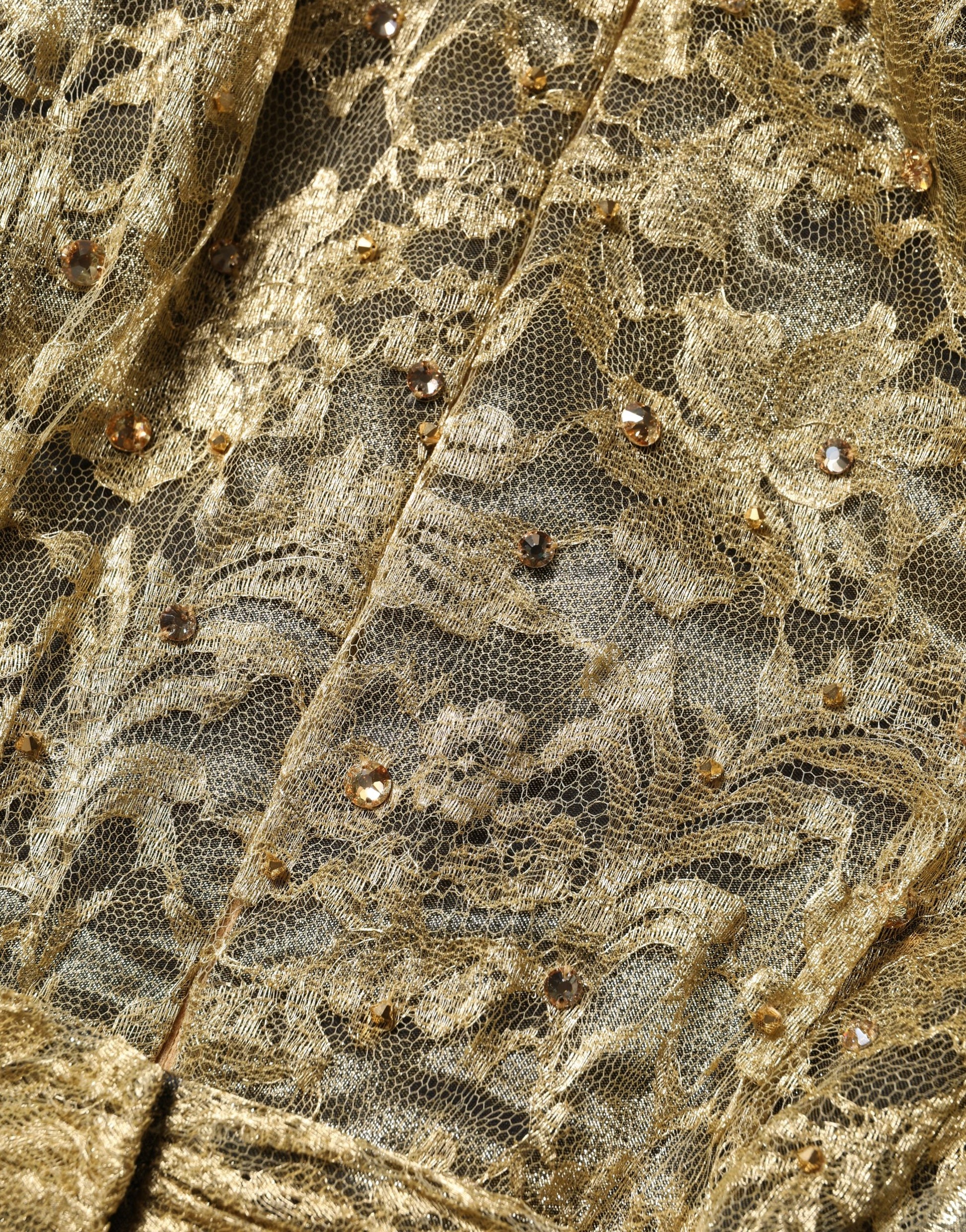 Robe Dolce & Gabbana en dentelle transparente dorée ornée de cristaux