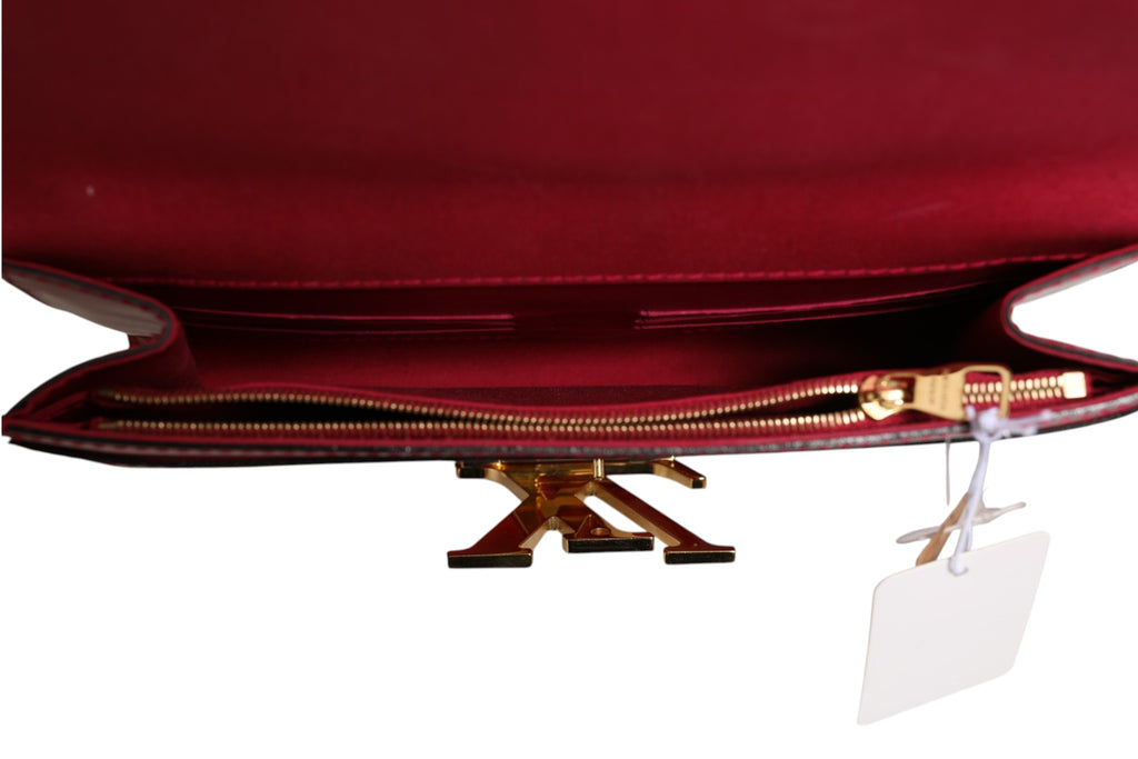 Portefeuille chaîne Louis Vuitton Louise PM en cuir verni rouge