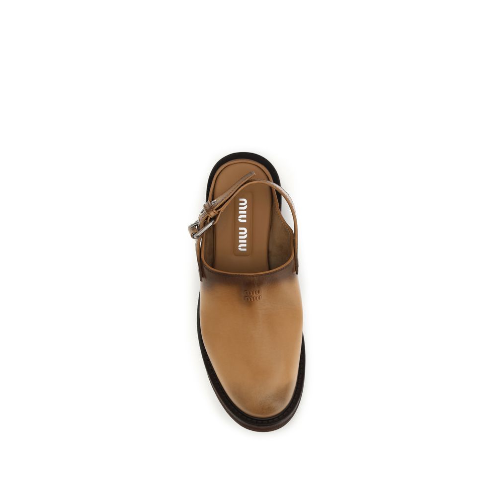 Mules Miu Miu en cuir de veau marron Bos Taurus