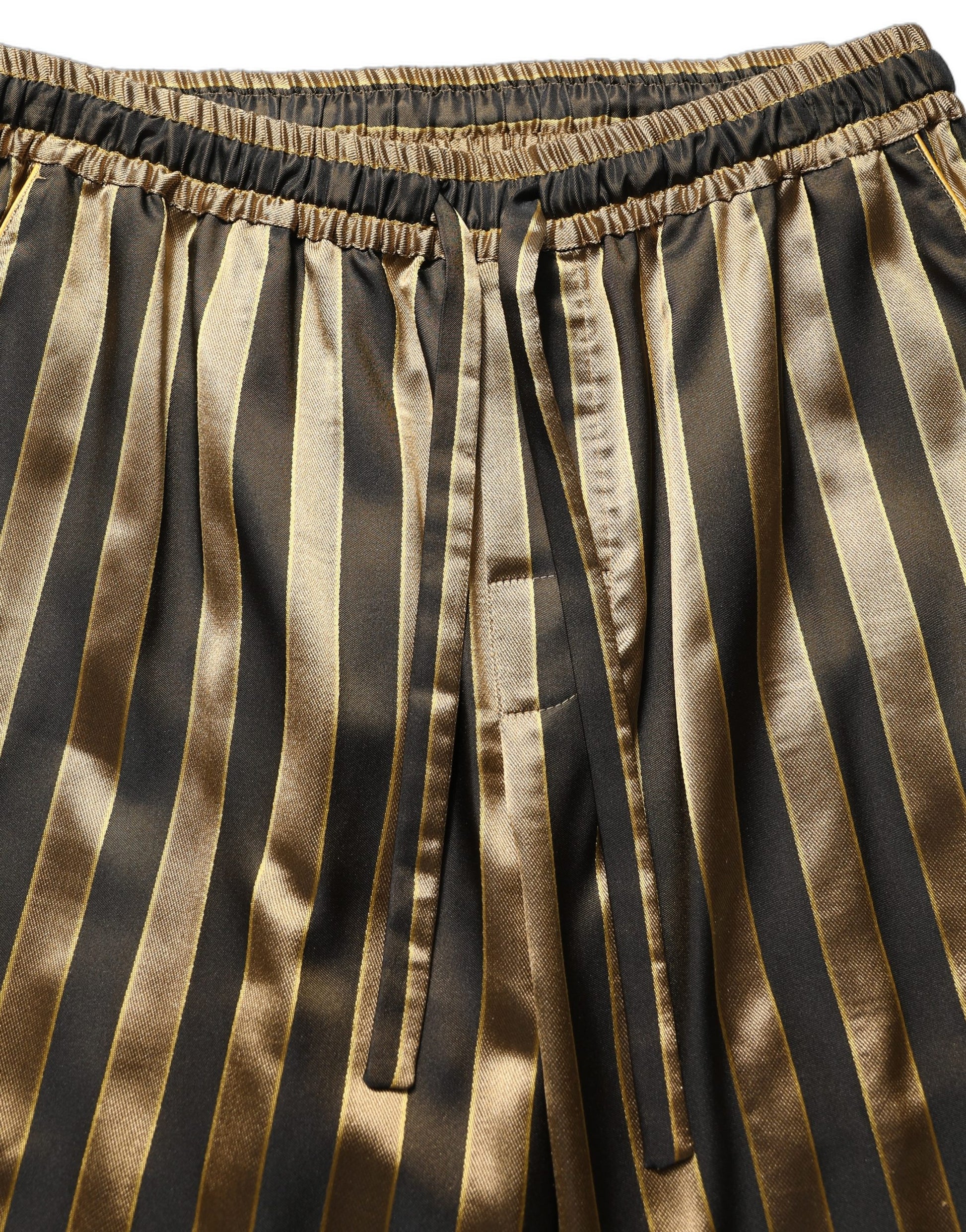 Pantalon fuselé homme Dolce & Gabbana en satin rayé or et noir