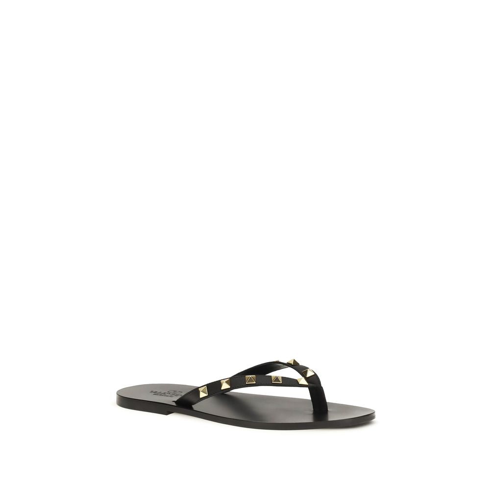 Valentino Garavani Sandales tongs en cuir de veau noir Bos Taurus