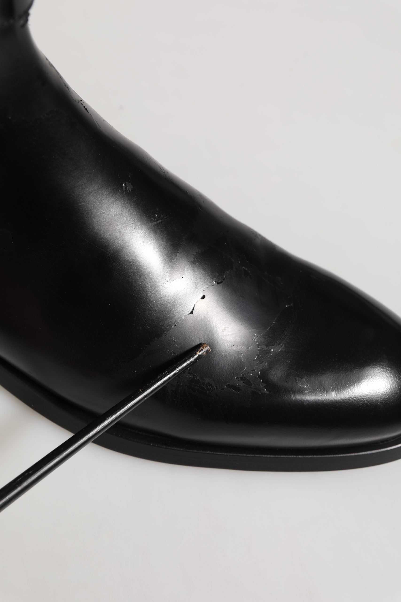 Bottes mi-mollet Dolce & Gabbana en cuir noir avec boucle logo