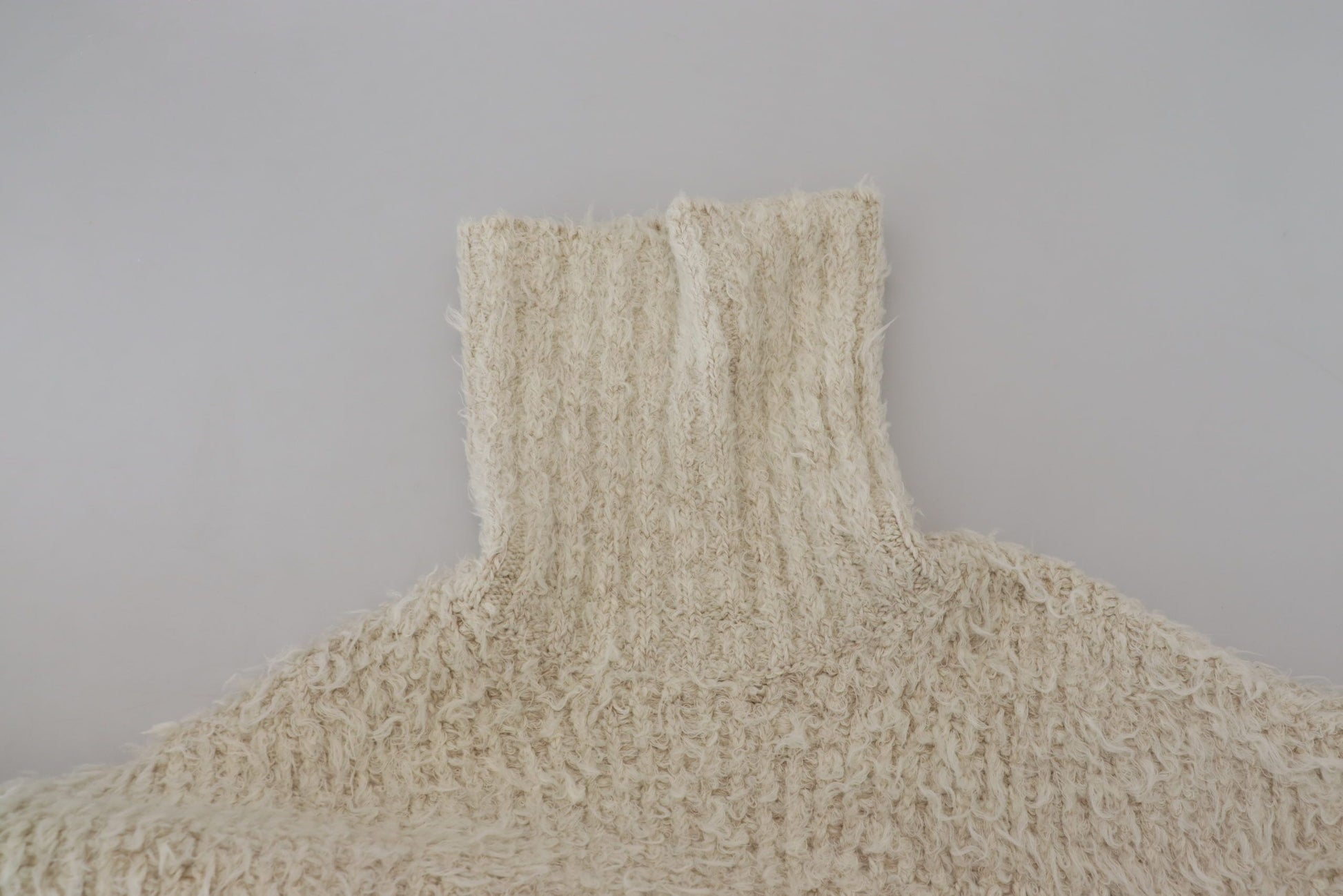 Pull en tricot de laine crème à col roulé Dolce & Gabbana