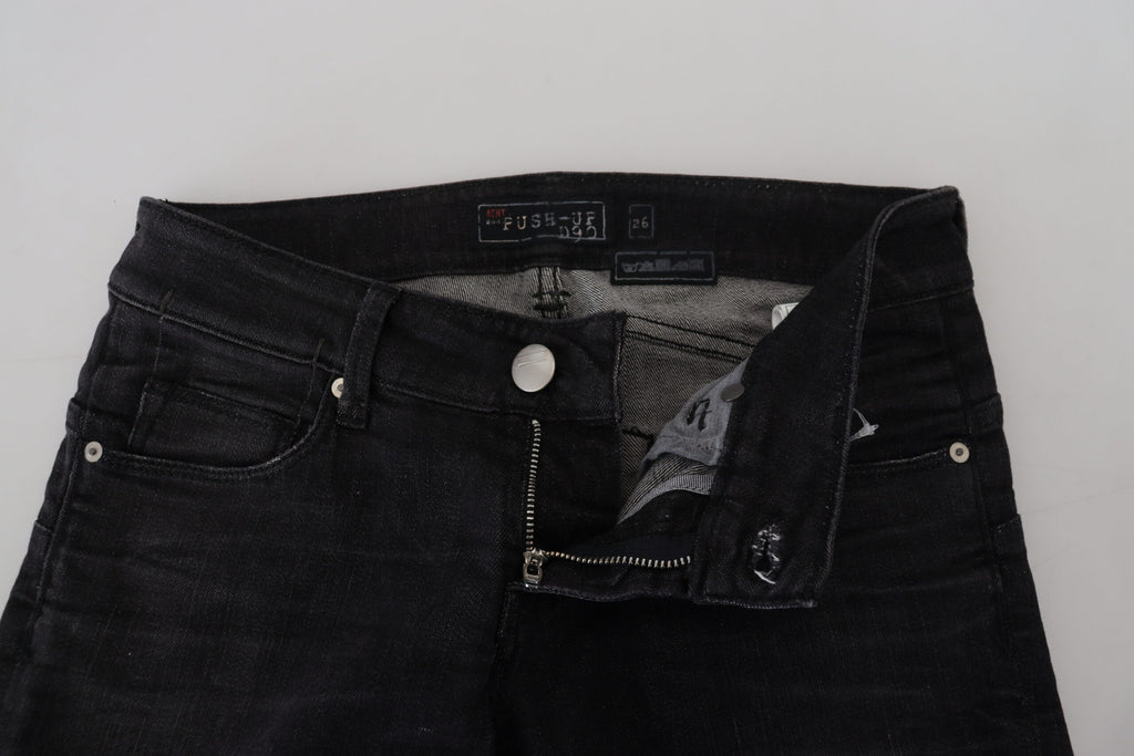 Acht Schwarze, schmal geschnittene Damen-Jeans aus Baumwolle mit niedriger Taille