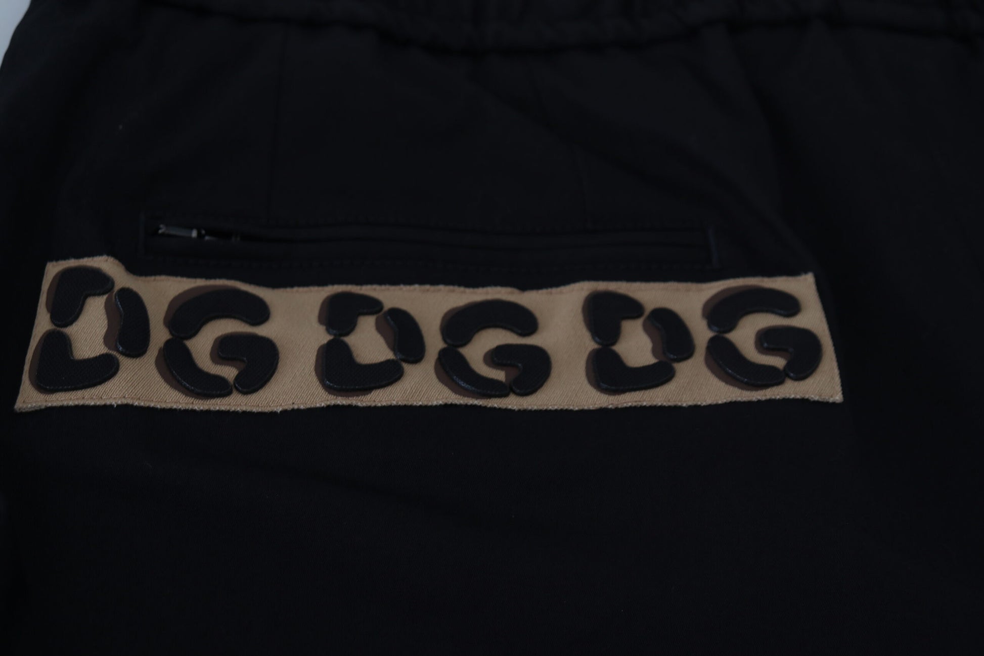Pantalon court Dolce & Gabbana en coton noir avec taille élastique et logo DG