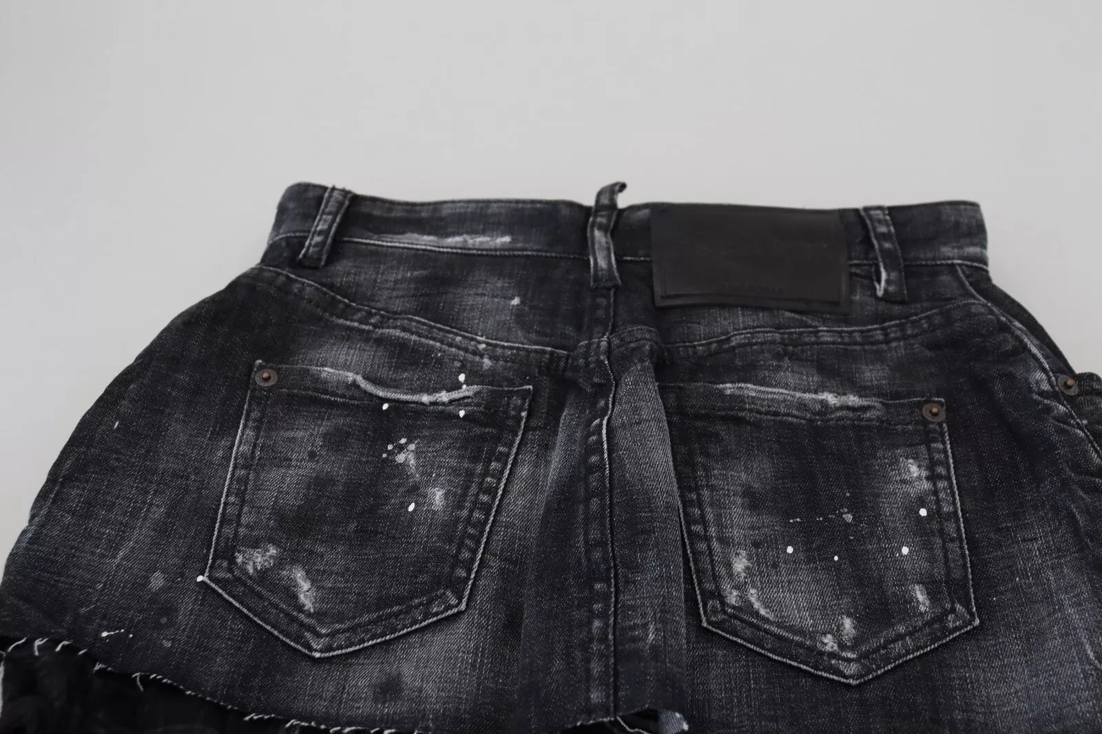 Mini-jupe en jean trapèze taille haute à carreaux noirs Dsquared²