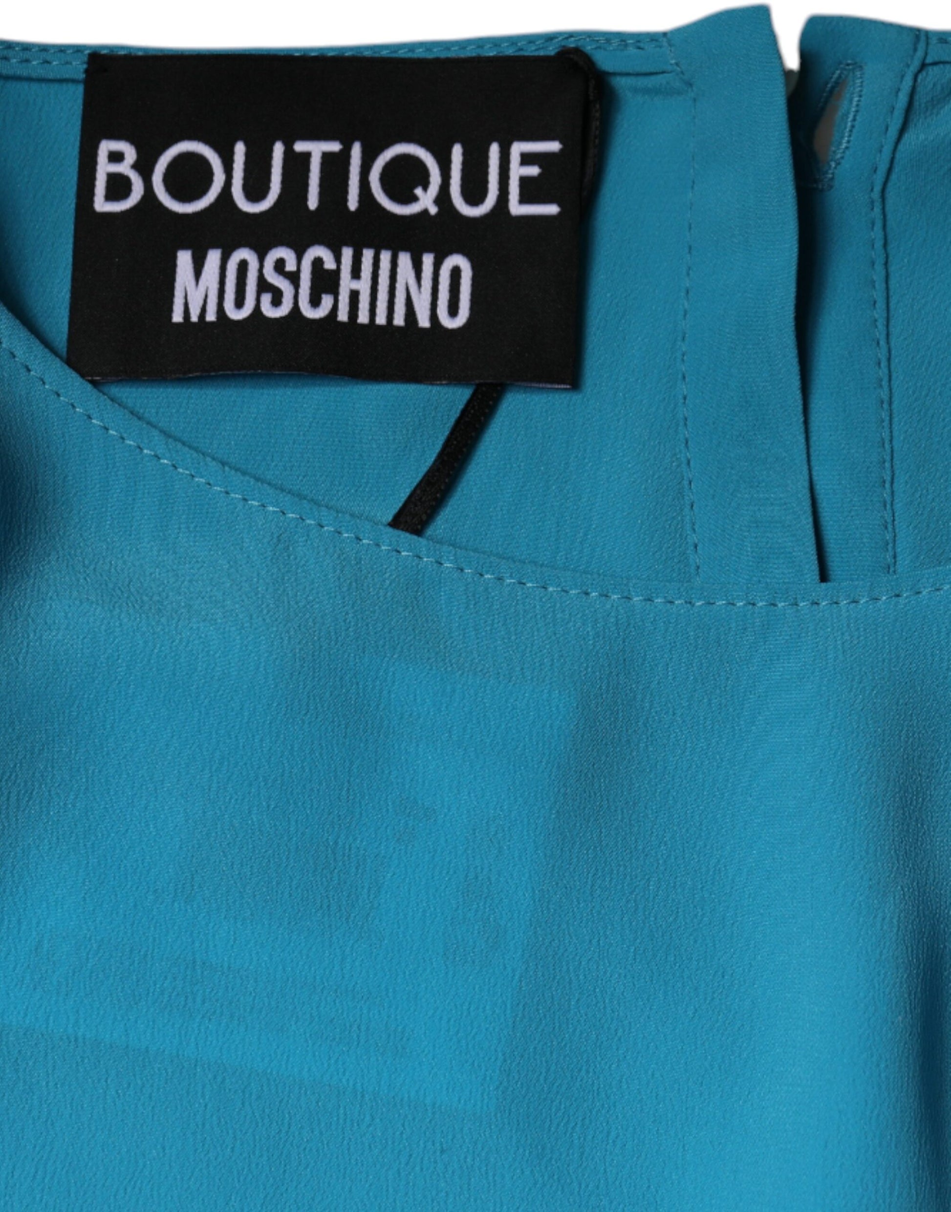 Haut blouse à manches longues et col rond bleu Boutique Moschino