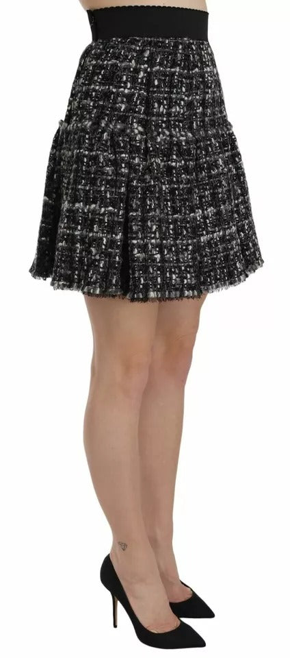 Mini-jupe en laine à carreaux noirs avec détails à volants Dolce & Gabbana
