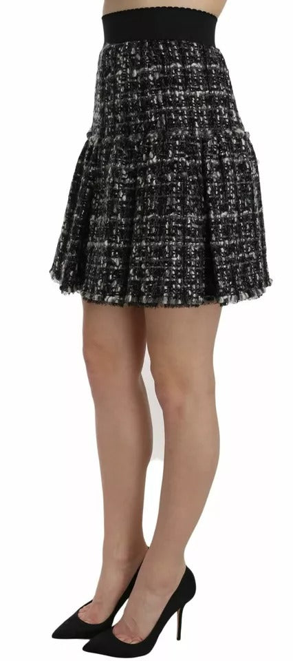 Mini-jupe en laine à carreaux noirs avec détails à volants Dolce & Gabbana