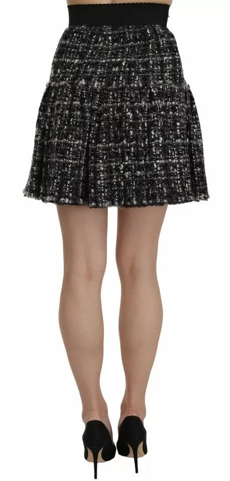 Mini-jupe en laine à carreaux noirs avec détails à volants Dolce & Gabbana