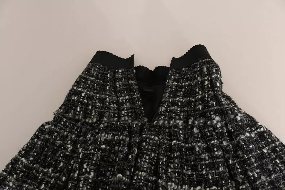 Mini-jupe en laine à carreaux noirs avec détails à volants Dolce & Gabbana