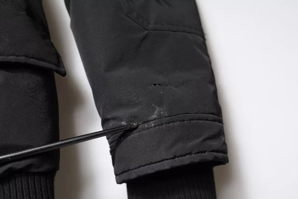 Woolrich – Schwarze, langärmlige Manteljacke aus Pelz und Lammfell mit Kapuze