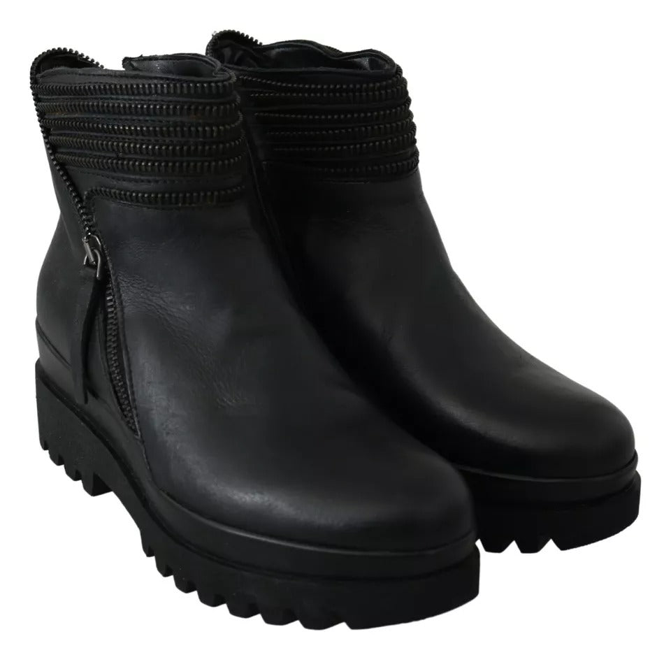Ovyé Schwarze Lederstiefeletten mit Reißverschluss