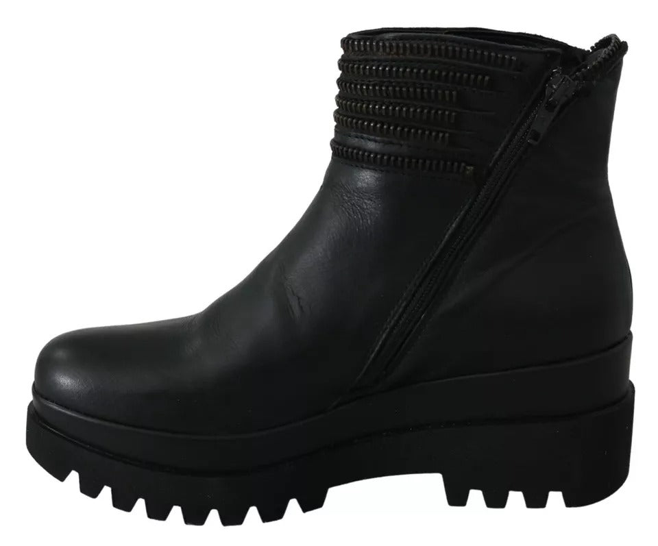 Ovyé Schwarze Lederstiefeletten mit Reißverschluss