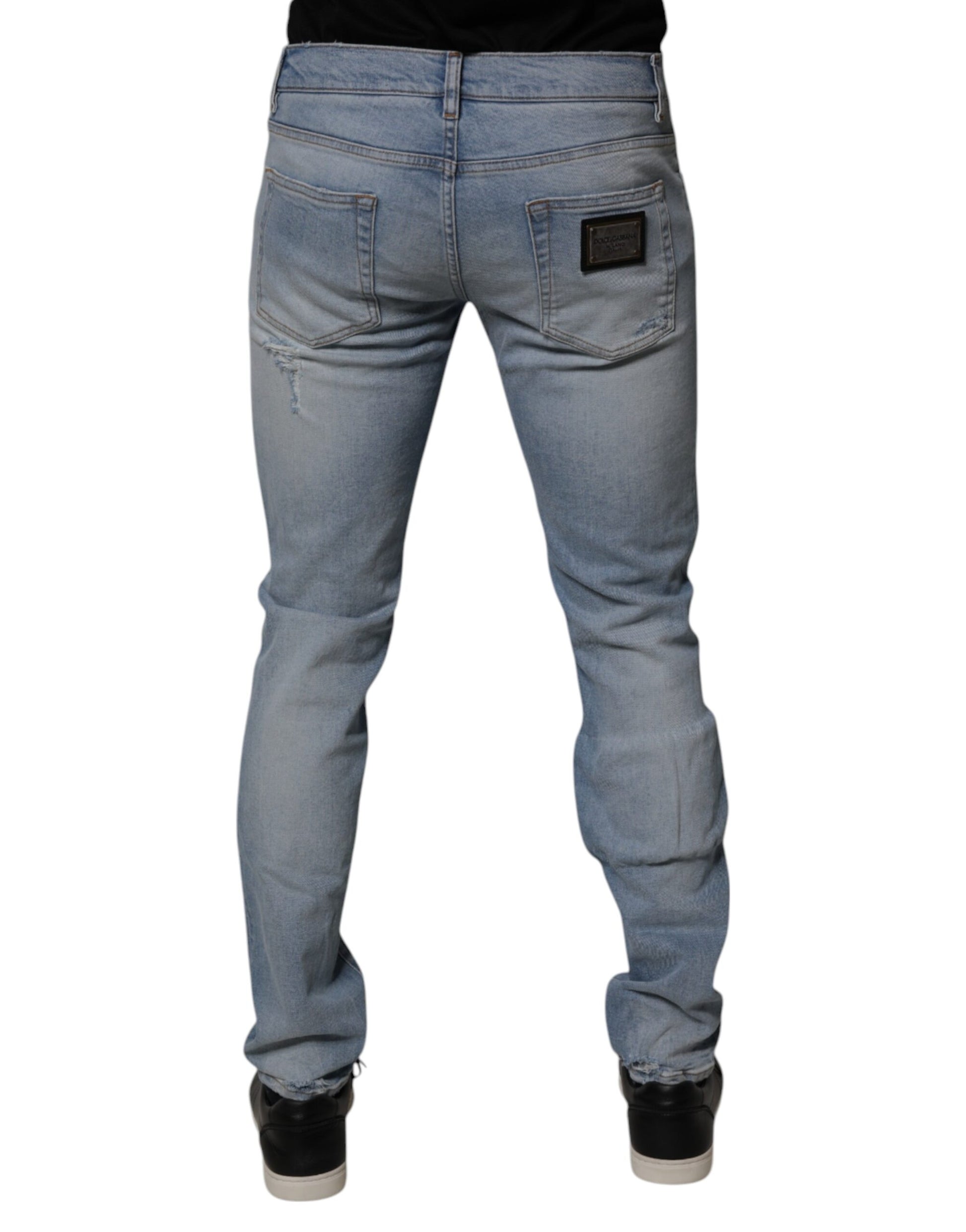Jeans slim en denim de coton déchiré bleu Dolce & Gabbana pour homme
