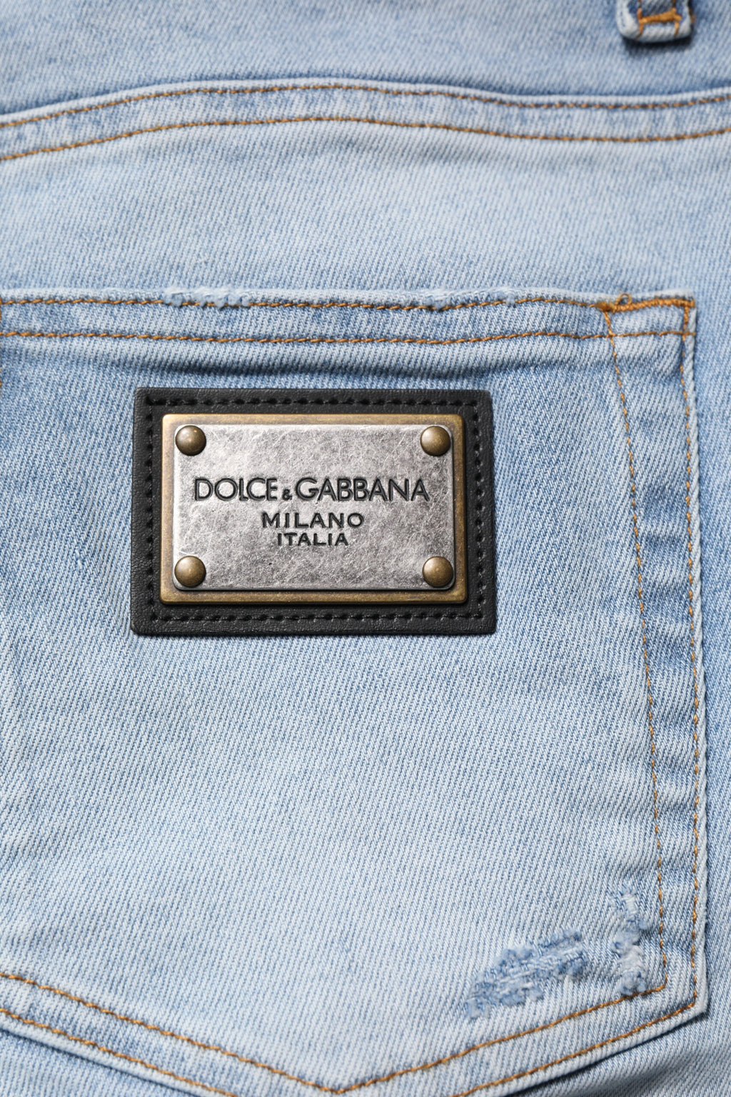 Jeans slim en denim de coton déchiré bleu Dolce & Gabbana pour homme