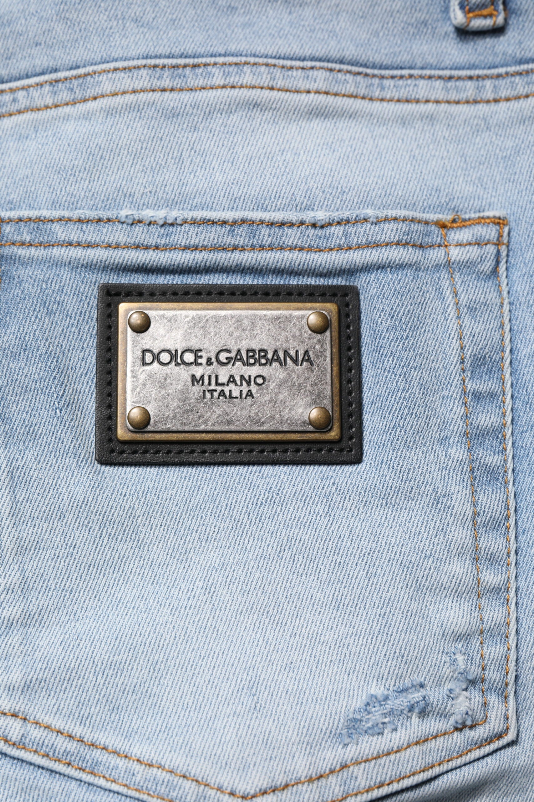 Jeans slim en denim de coton déchiré bleu Dolce & Gabbana pour homme