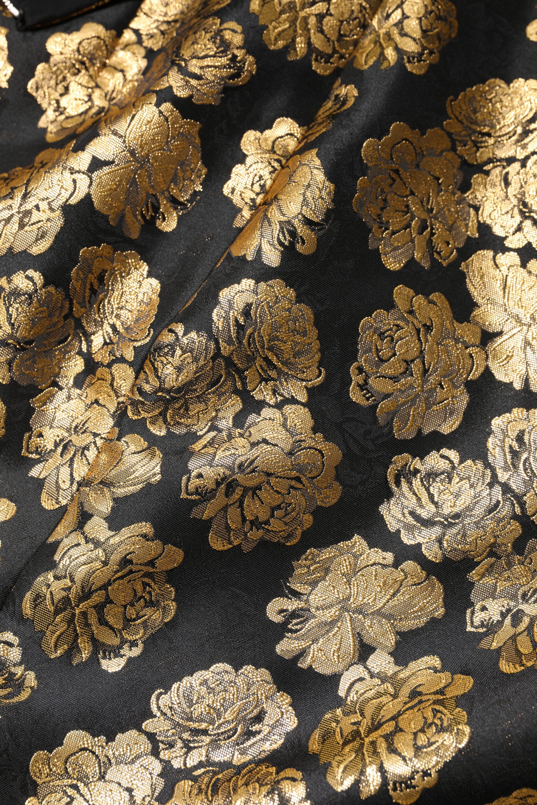 Mini-jupe en jacquard à imprimé floral noir et doré Dolce & Gabbana