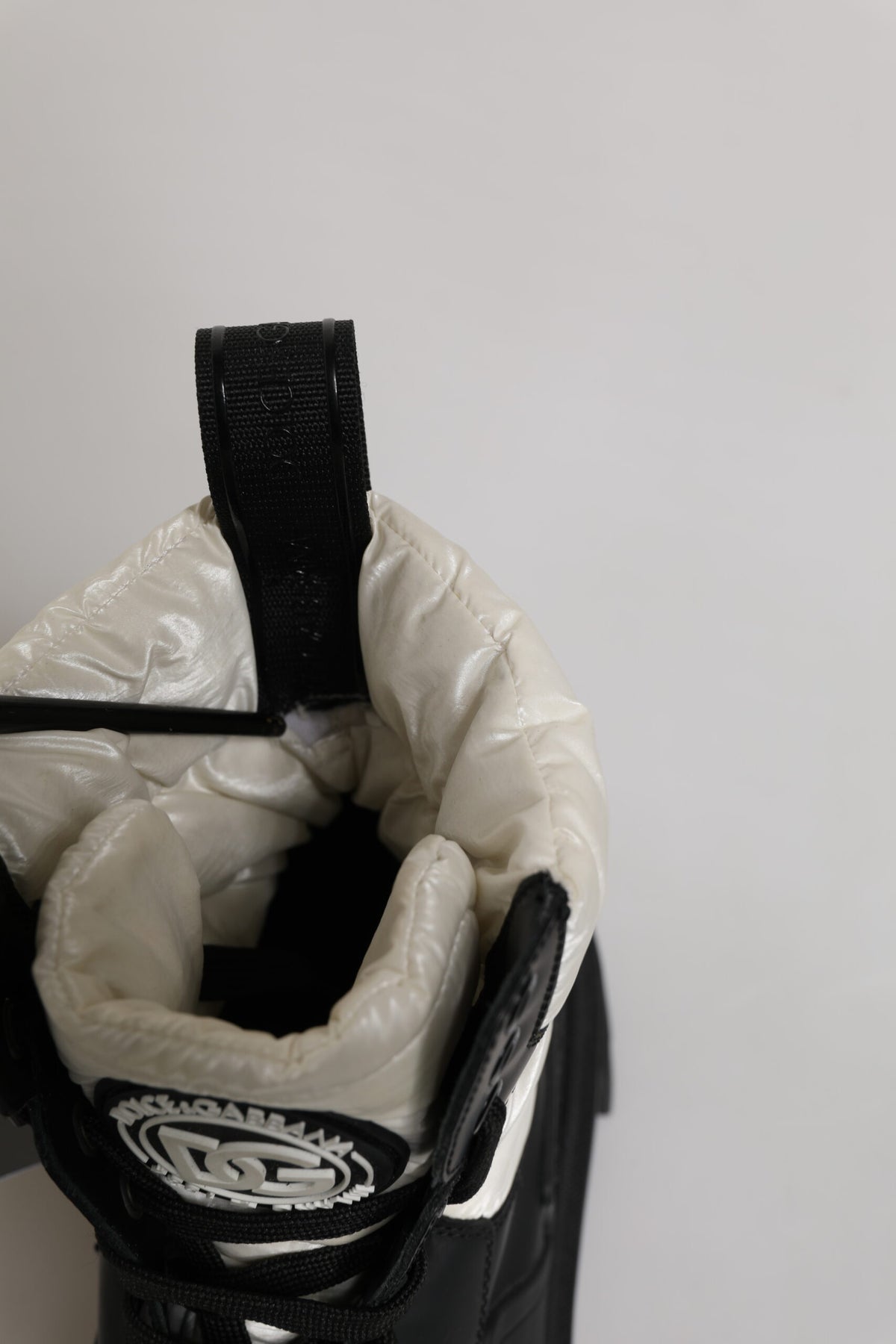 Bottes mi-mollet lacées matelassées noires et blanches Dolce & Gabbana