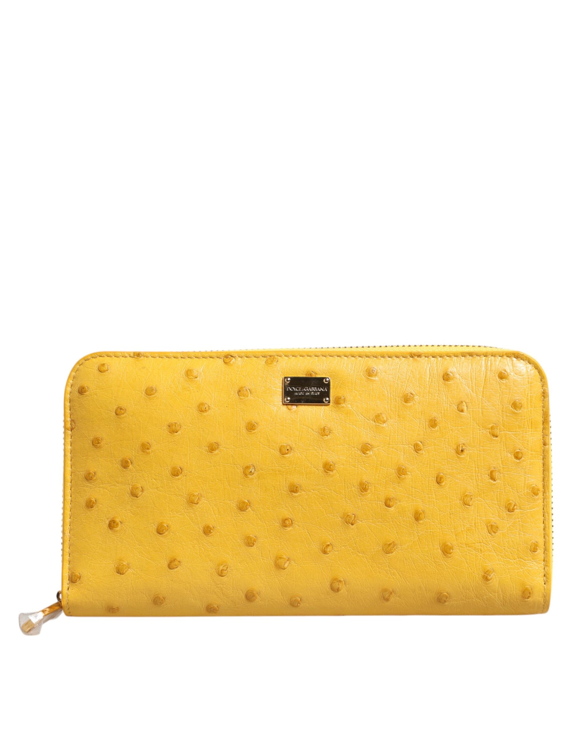 Portefeuille Continental Dolce & Gabbana en cuir jaune avec plaque logo et fermeture éclair