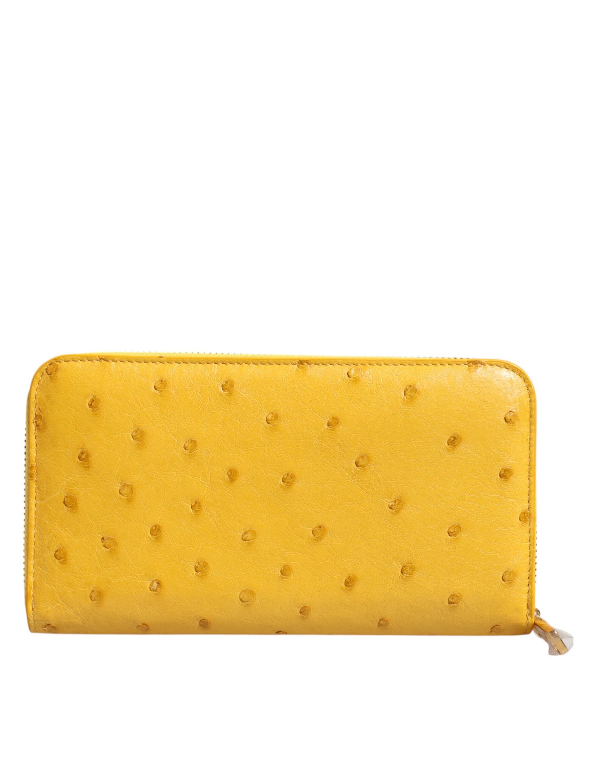 Portefeuille Continental Dolce & Gabbana en cuir jaune avec plaque logo et fermeture éclair