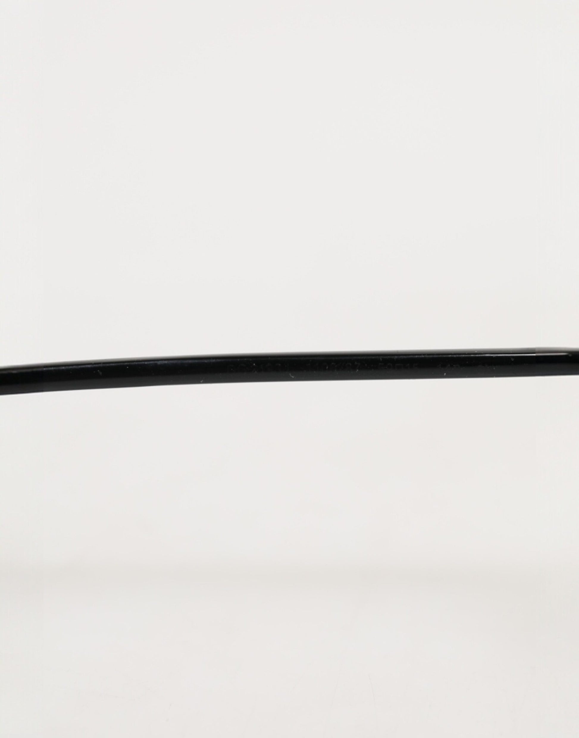 Lunettes de soleil Dolce & Gabbana avec monture métallique noire et verres carrés
