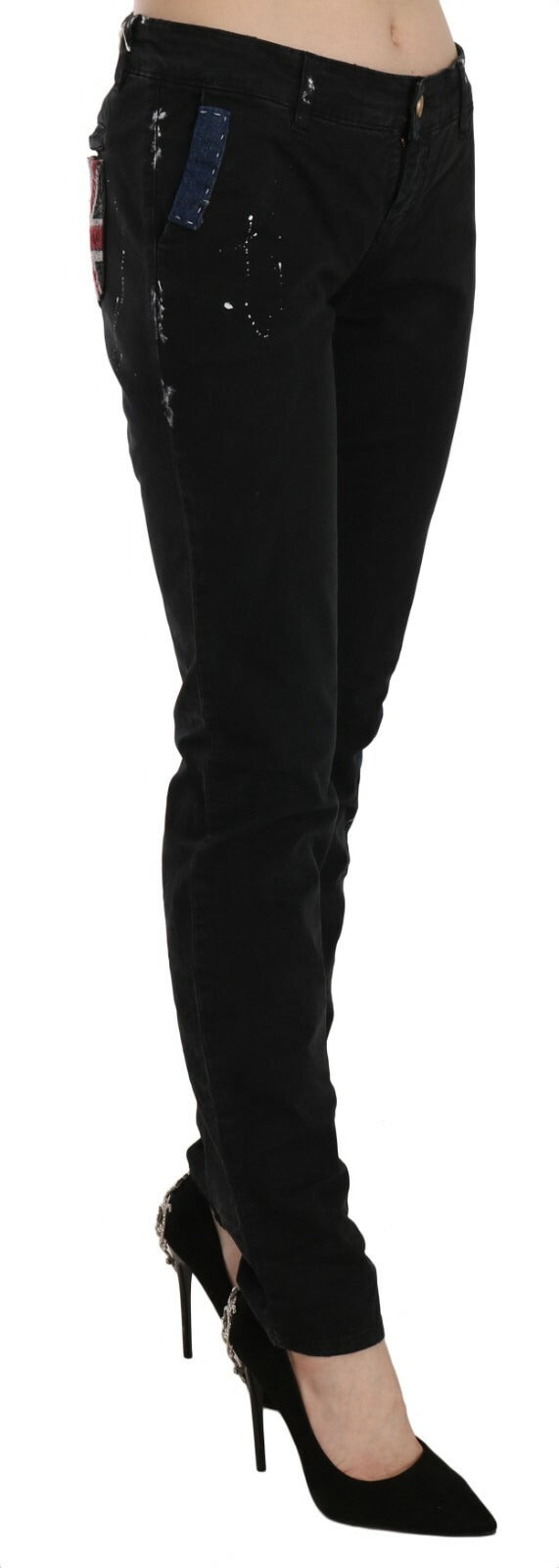 Jean slim noir taille basse à peinture blanche John Galliano