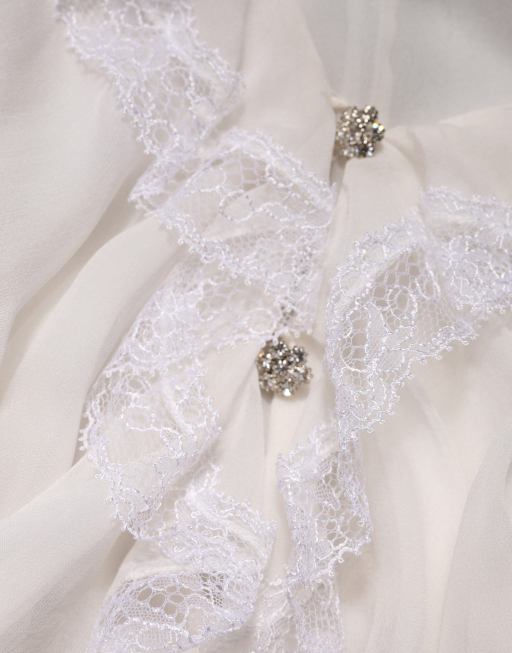 Chemisier blanc à manches longues en dentelle et volants Dolce & Gabbana