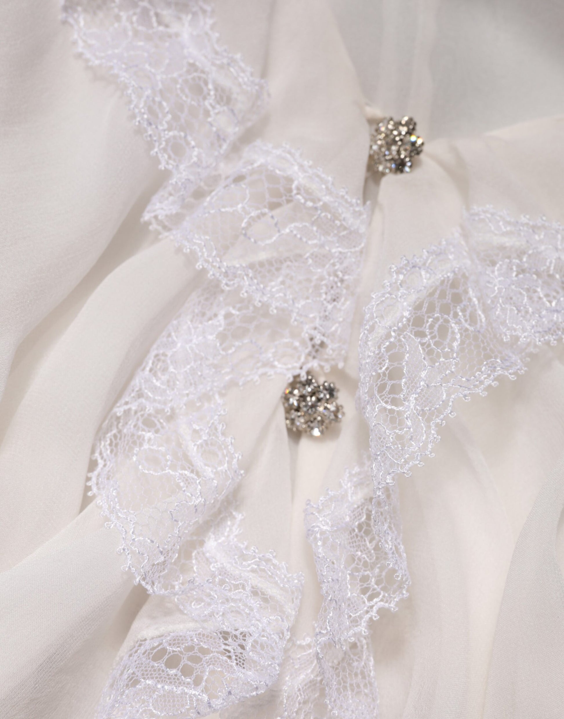 Chemisier blanc à manches longues en dentelle et volants Dolce & Gabbana