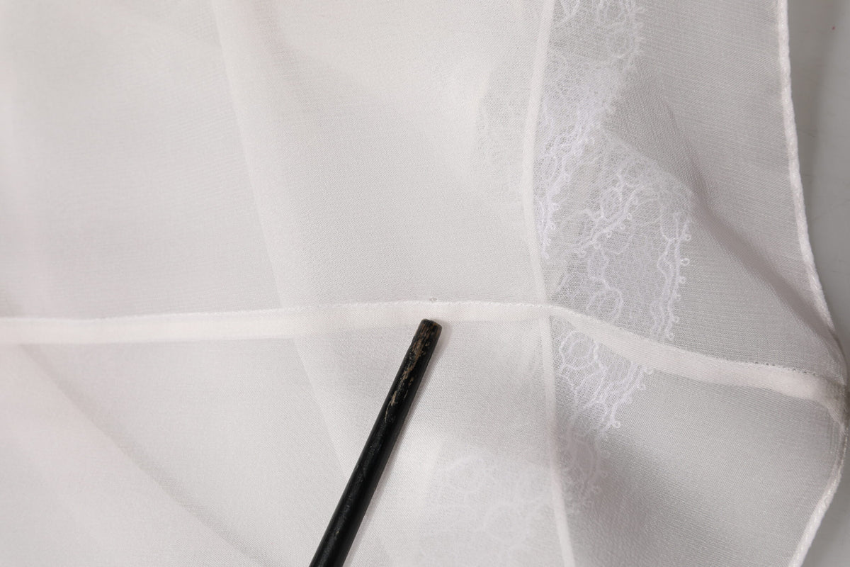 Chemisier blanc à manches longues en dentelle et volants Dolce & Gabbana