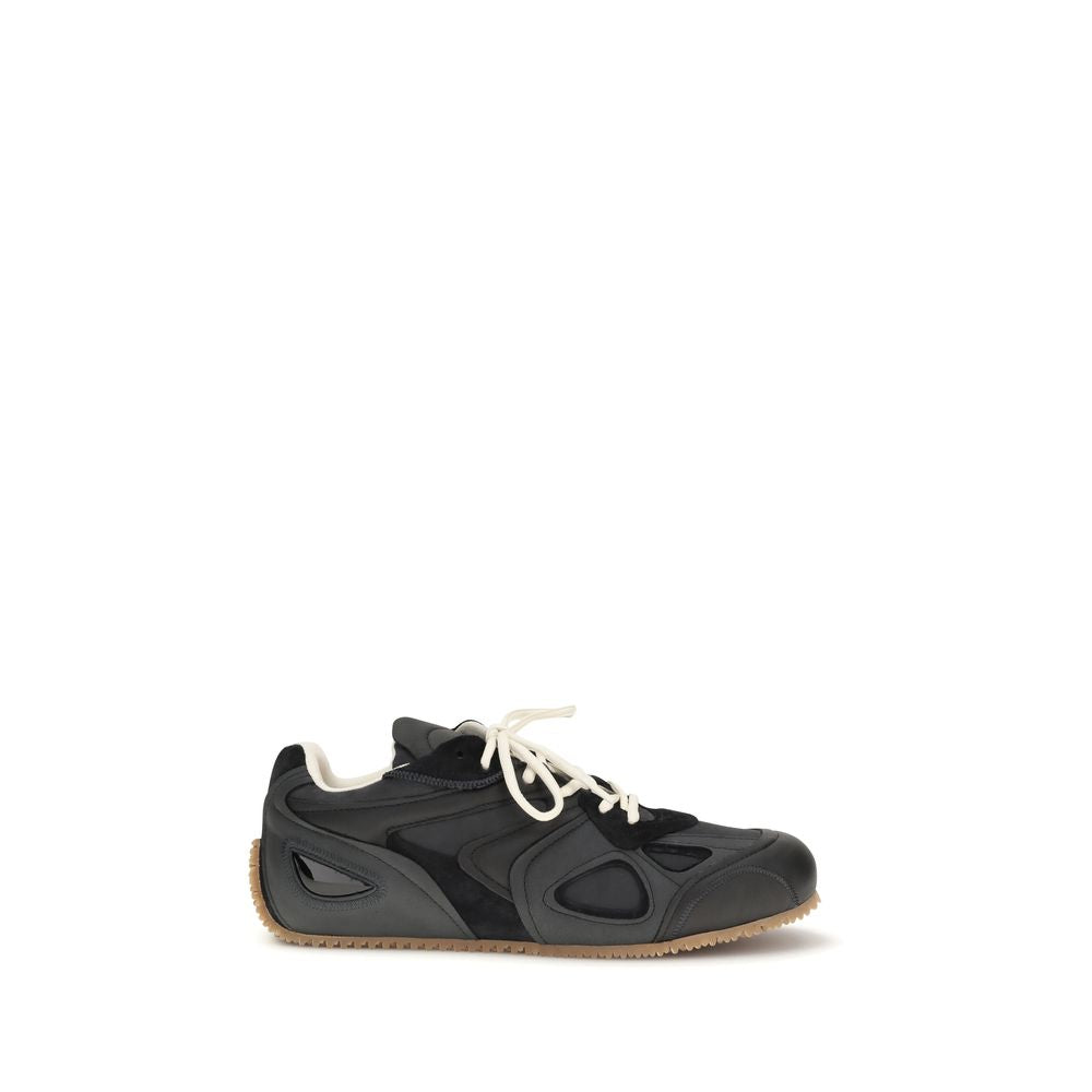Baskets basses Axel Arigato en cuir de veau noir Bos Taurus