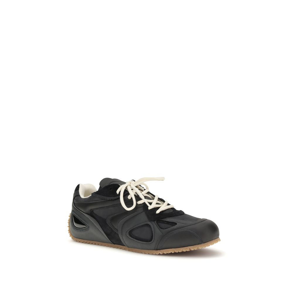Baskets basses Axel Arigato en cuir de veau noir Bos Taurus