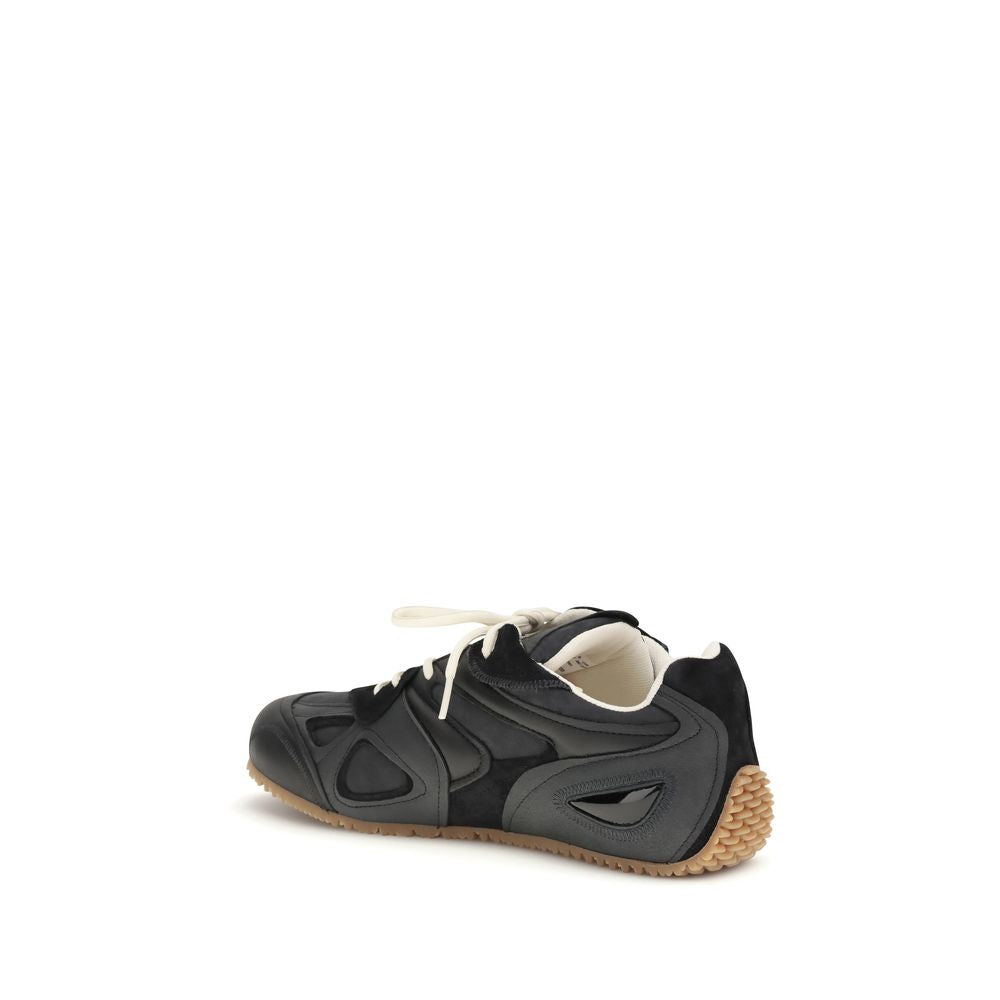 Baskets basses Axel Arigato en cuir de veau noir Bos Taurus