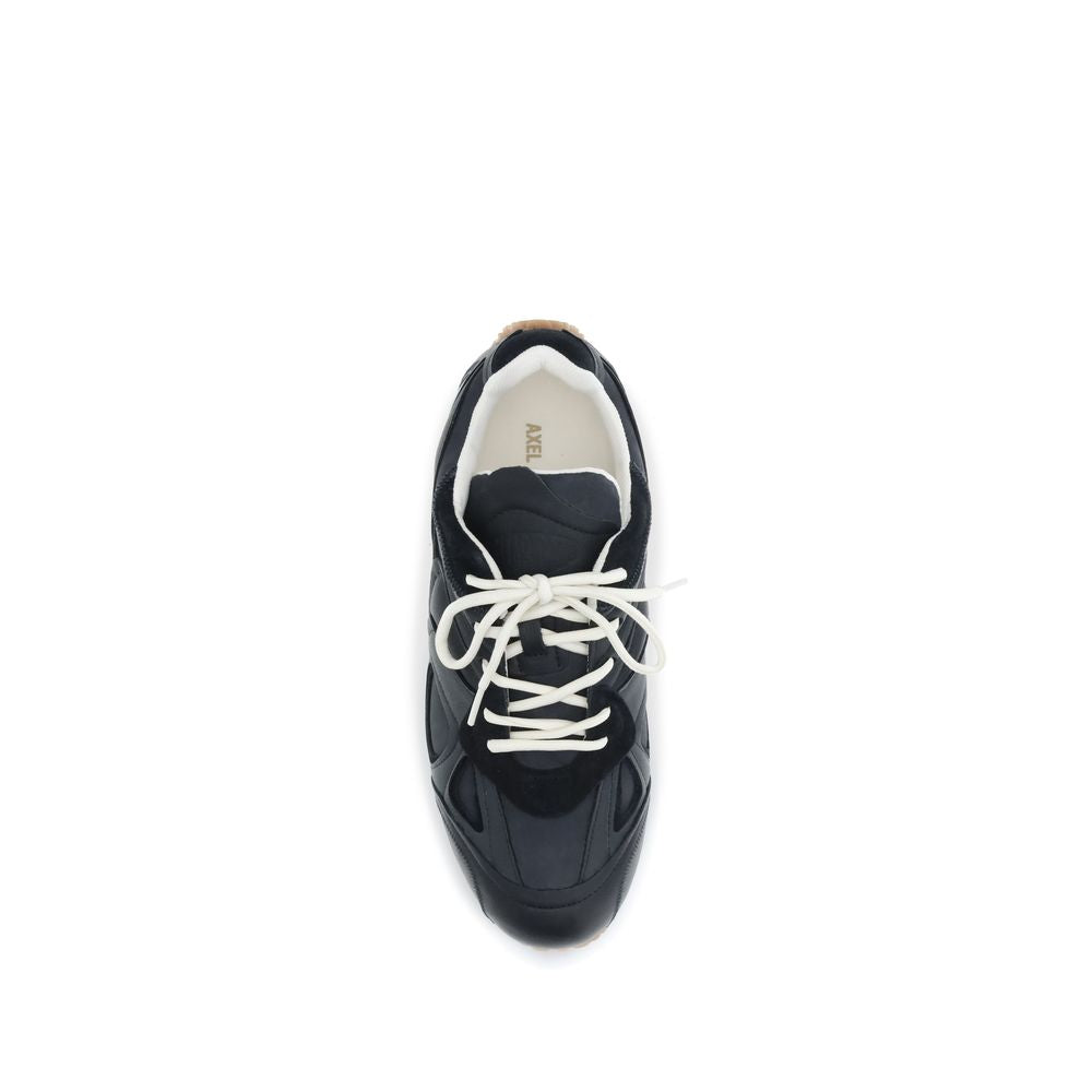 Baskets basses Axel Arigato en cuir de veau noir Bos Taurus