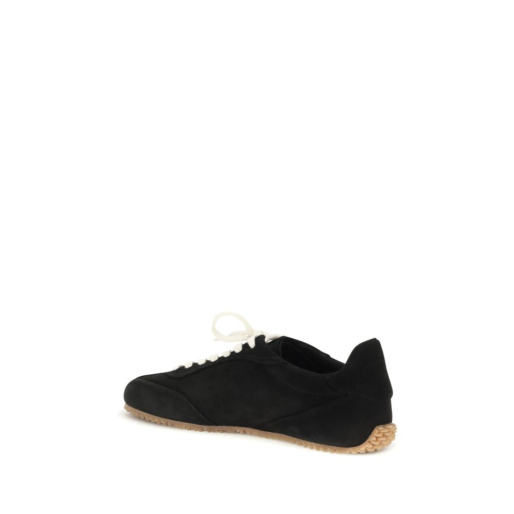 Baskets basses Axel Arigato en cuir de veau noir Bos Taurus