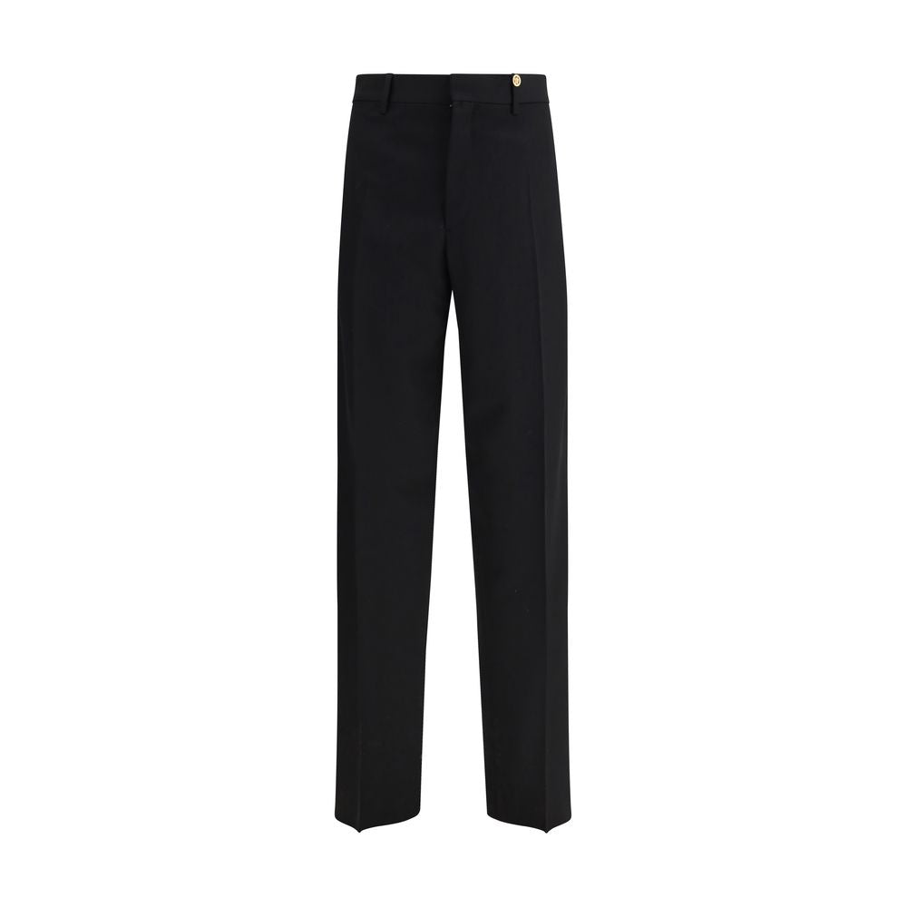 Pantalon habillé Versace en laine noire Oves Aries